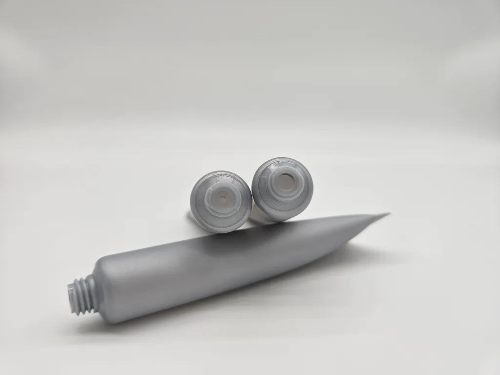 grey-soft-tube-container.webp